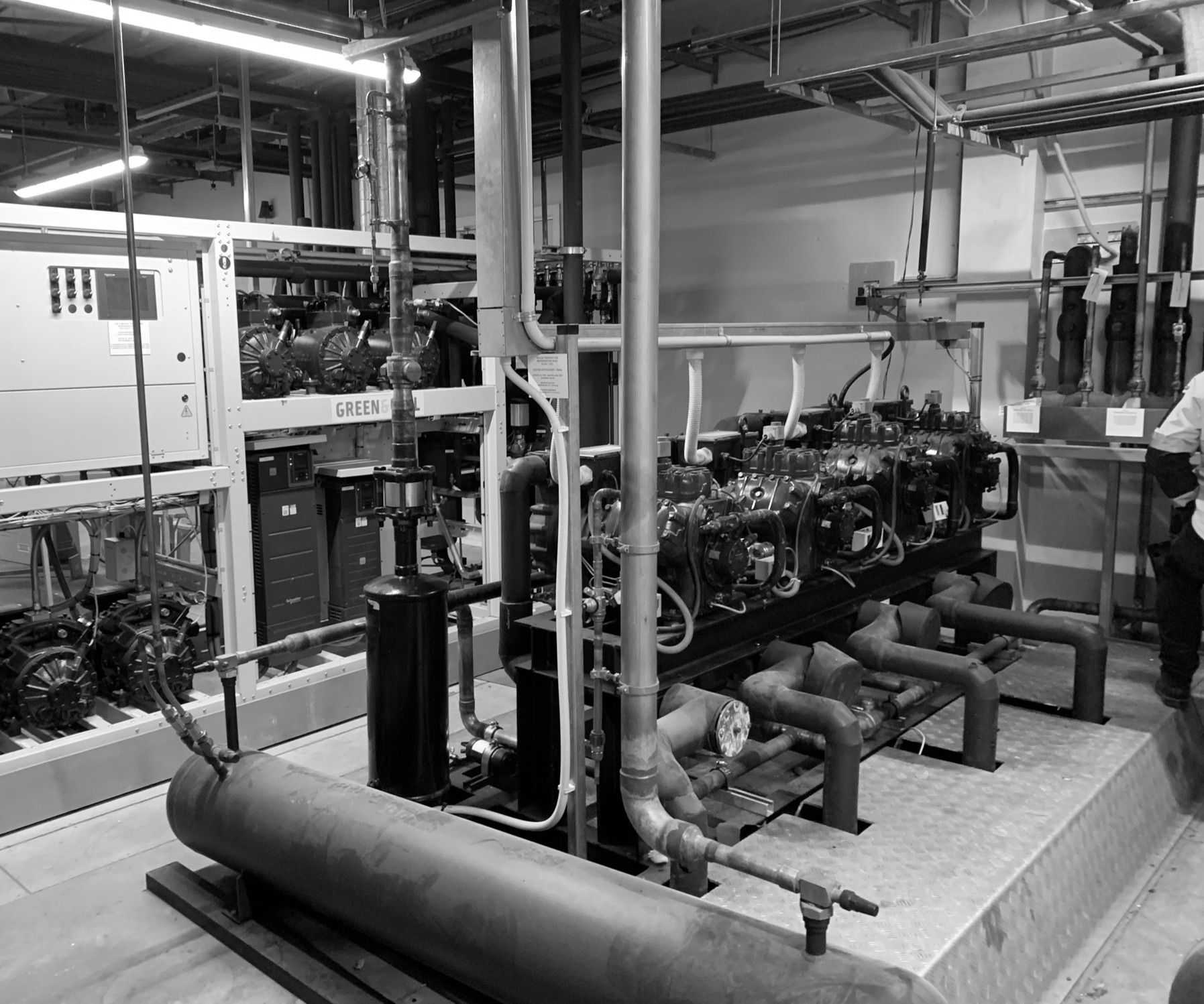 Refrigeration compressor pack and pipework in plant room