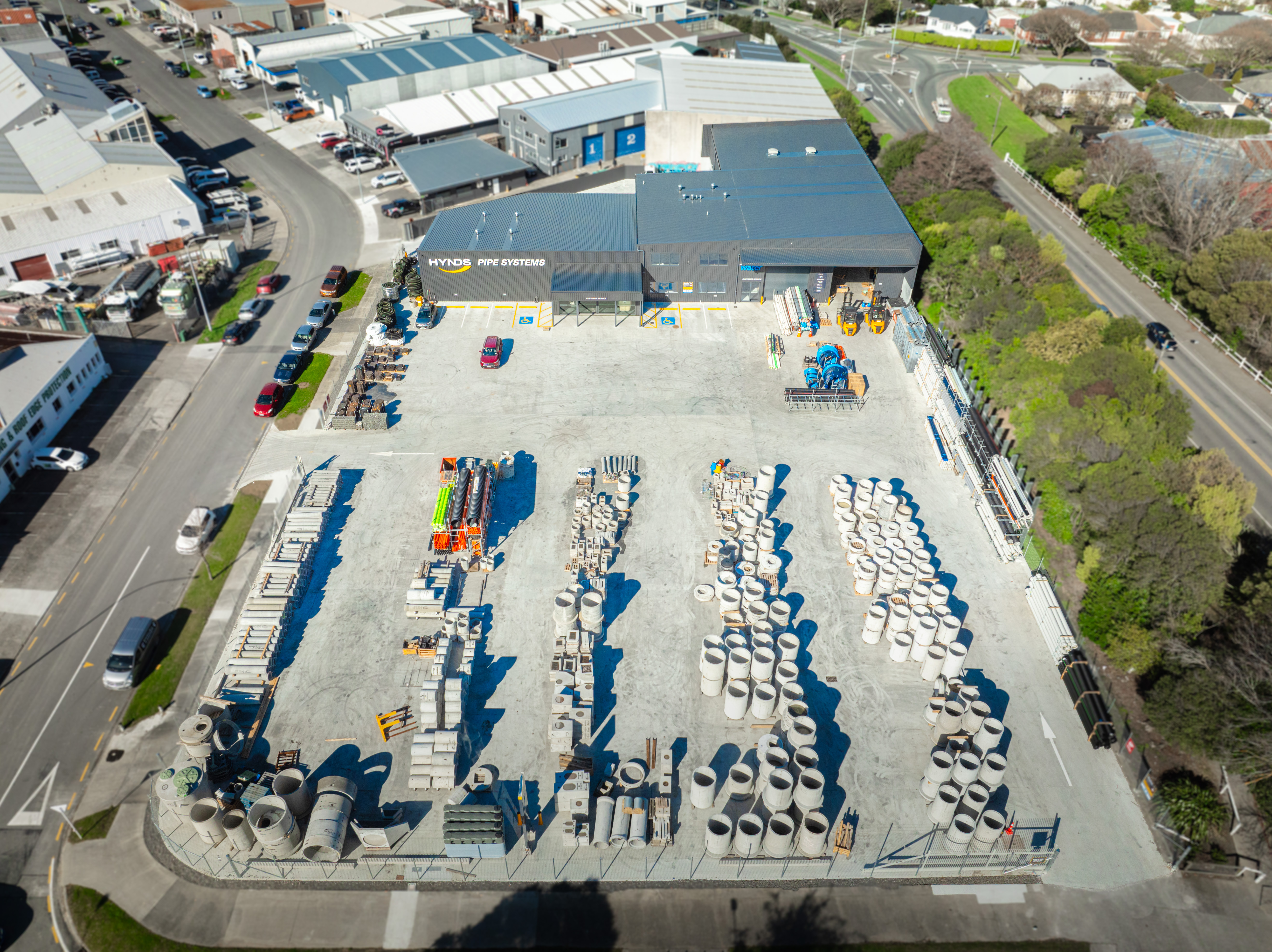 Aerial of the operational yard with rows of concrete pipe product